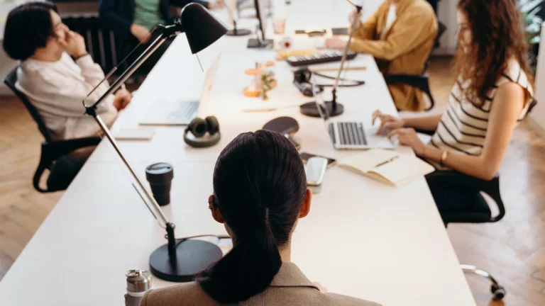 Stock photo - people in a meeting banner