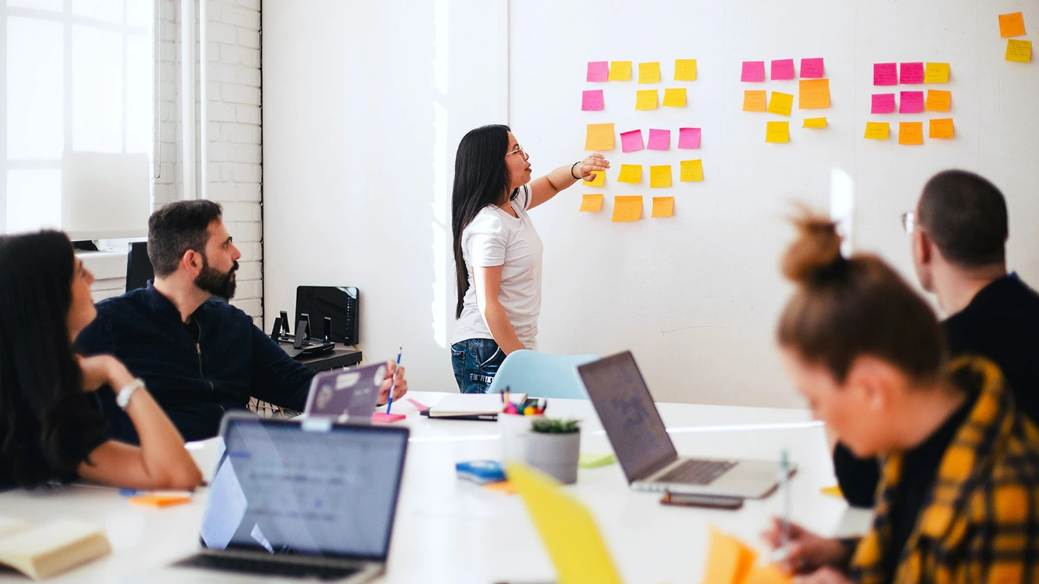 Stock photo - people in a meeting room banner