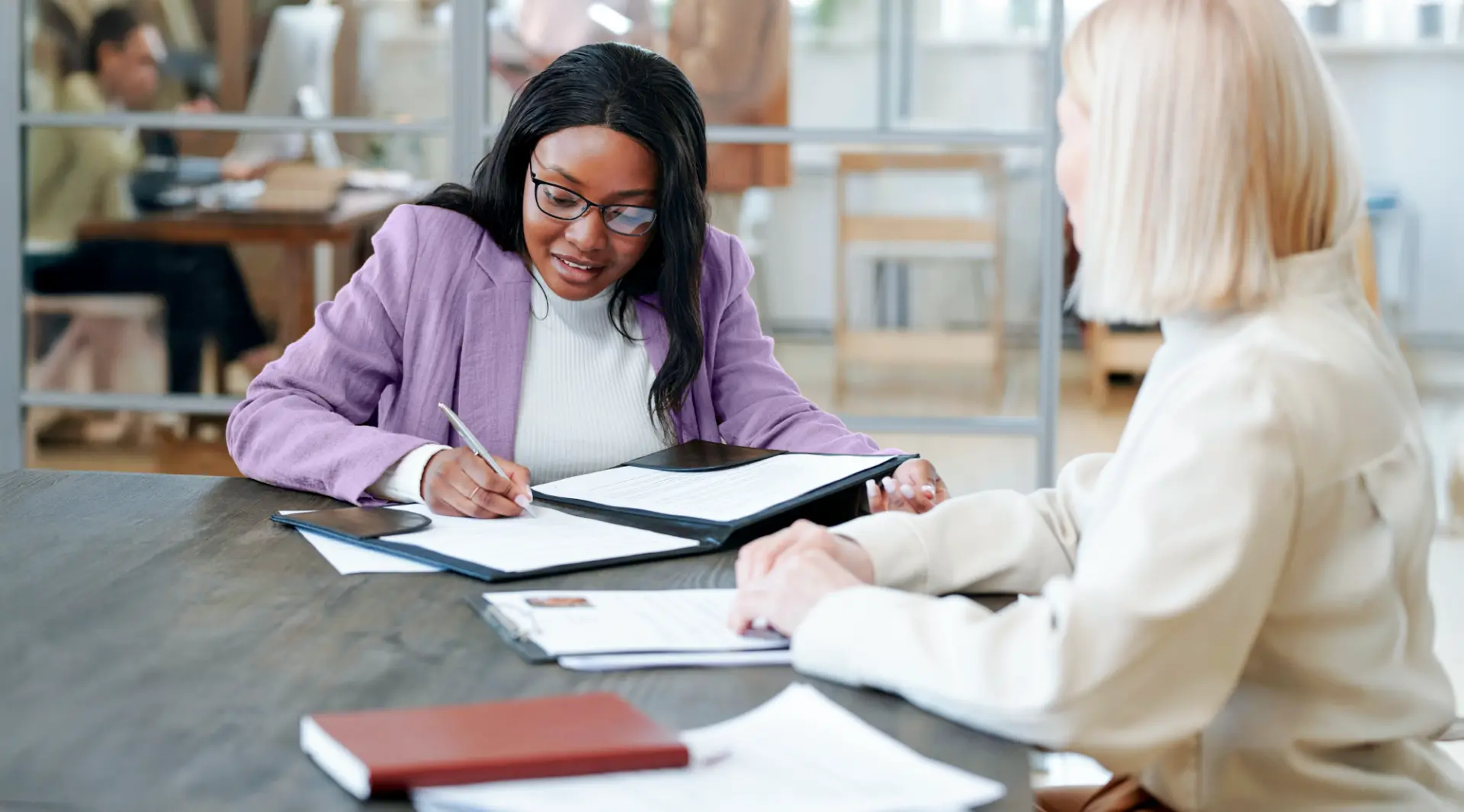 Woman interviewing another woman